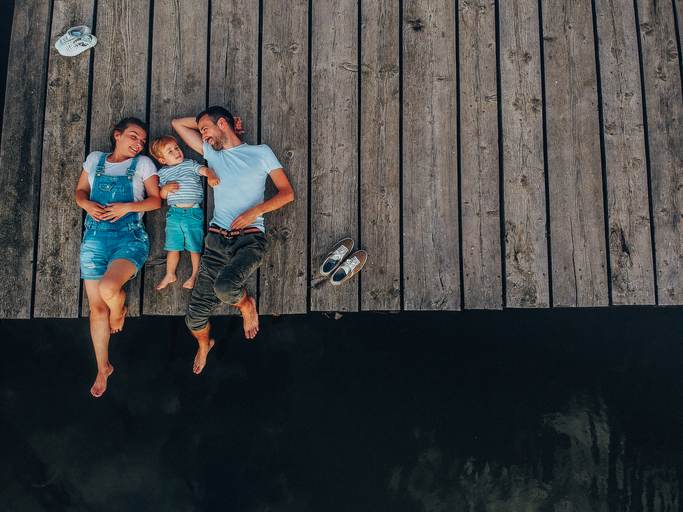 Loving family on a lake trip