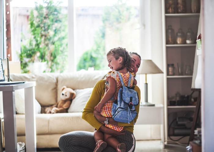 Loving mom sends adorable daughter off to school