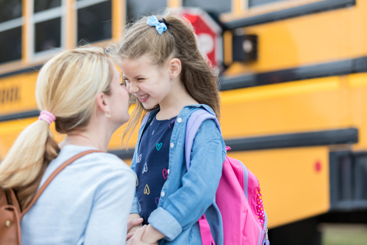 Loving mom sends adorable daughter off to school